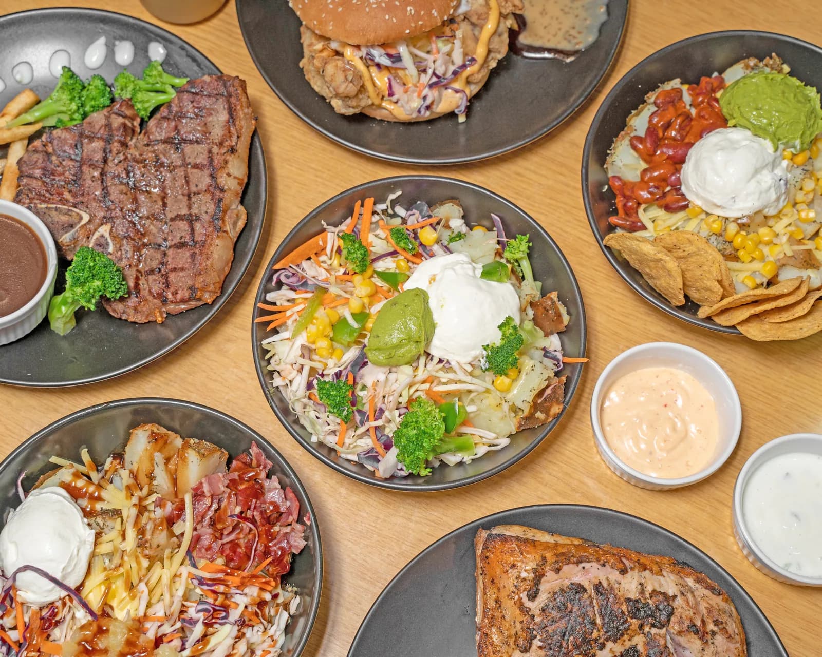 A selection of SpudCo loaded potatoes, burgers and meals